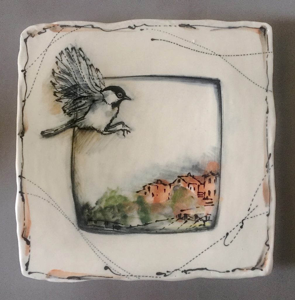 Square plate, bird alights